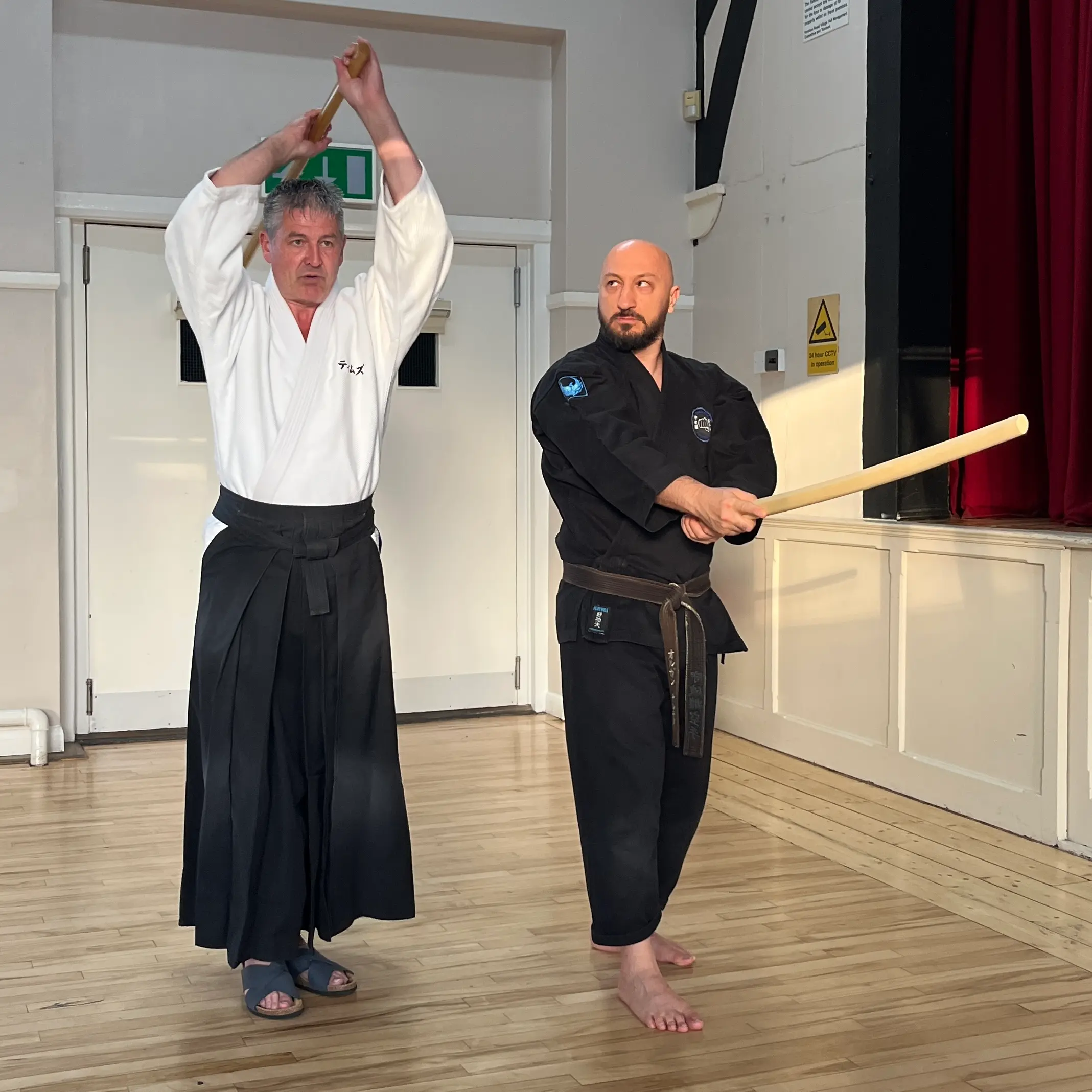 Olgun Tiltay learning bokken cuts from William Timms Sensei [7th Dan Aikido]